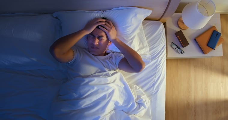 asian man has insomnia